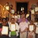 Teachers with certificates at the graduation ceremony